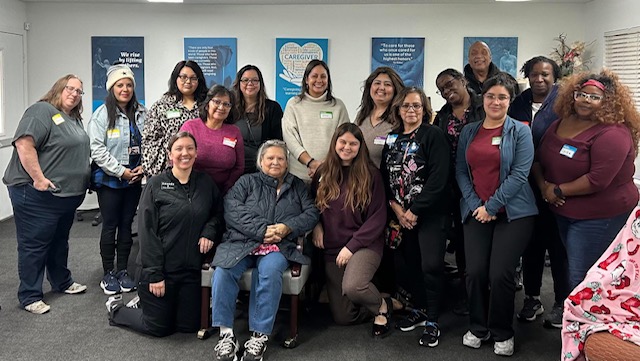 Amanda with a team of care staff after a training session
