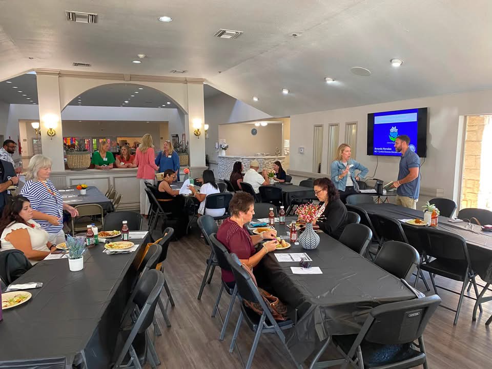 Guests gathering at a dementia skills community presentation
