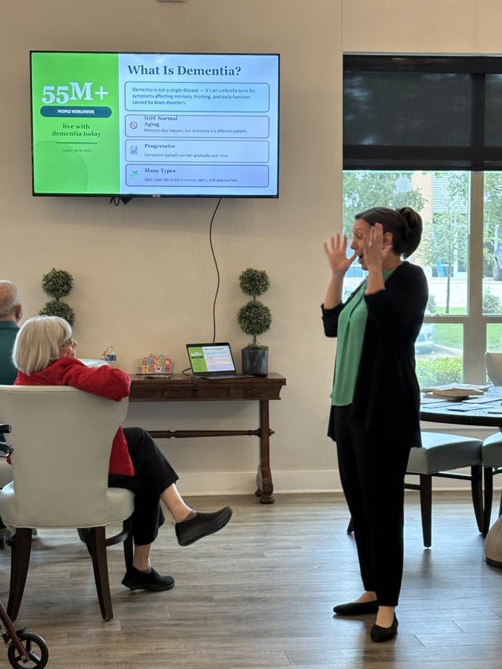 Amanda teaching a What Is Dementia presentation to residents